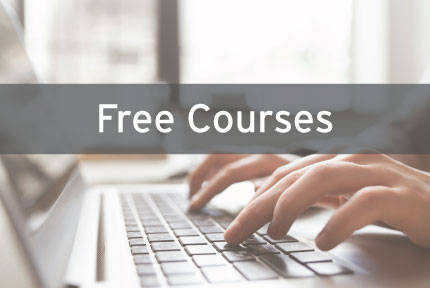 Typing on laptop with text "Free Courses"